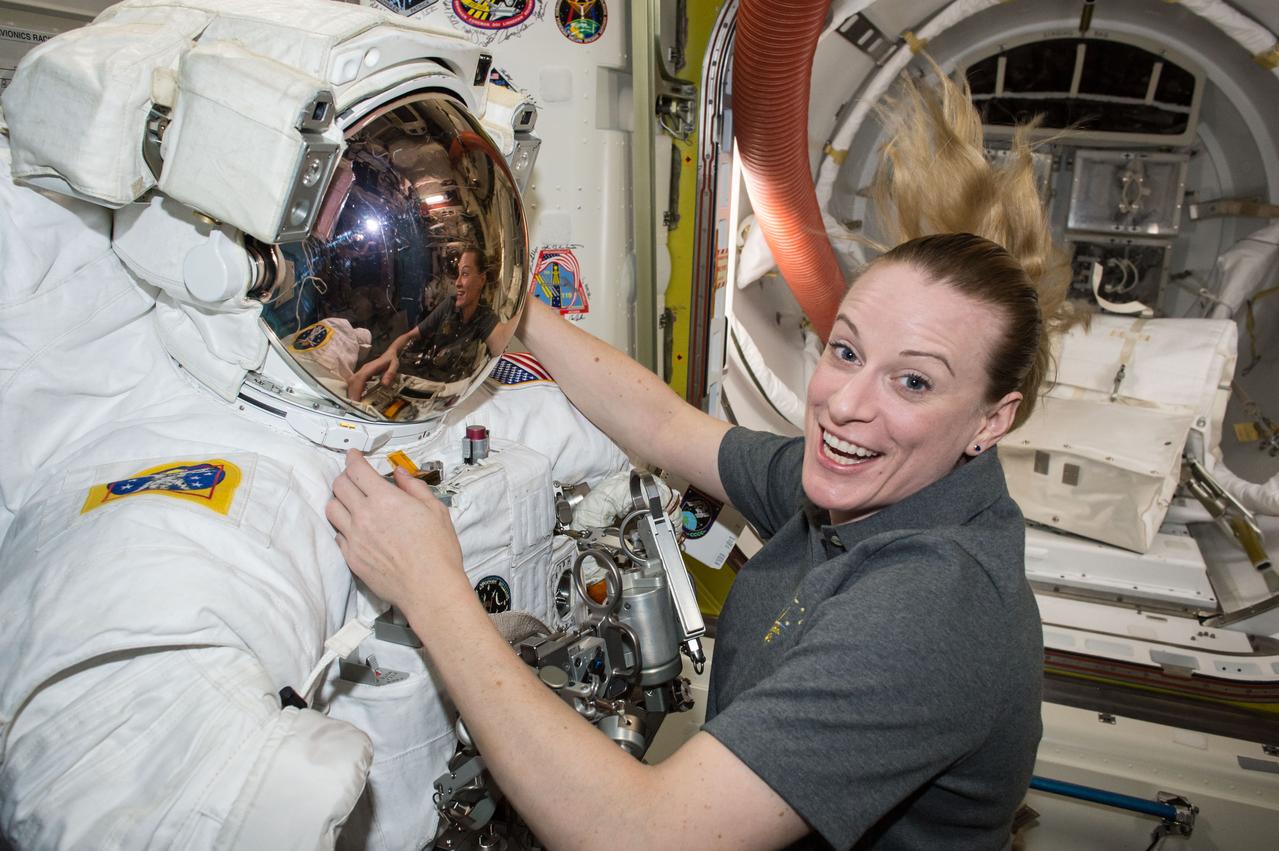 ISS048e055780 (08/10/2016) --- NASA astronaut Kate Rubins prepares for a spacewalk (EVA) on board the international Space Station. She and partner crewmember Jeff Williams also of NASA will work on installation of a new International Docking Adapter. The work is scheduled to start on Aug 19, 2016.. The work of spacewalkers Williams and Rubins will enable future crew vehicles from Boeing and SpaceX to dock on the station.