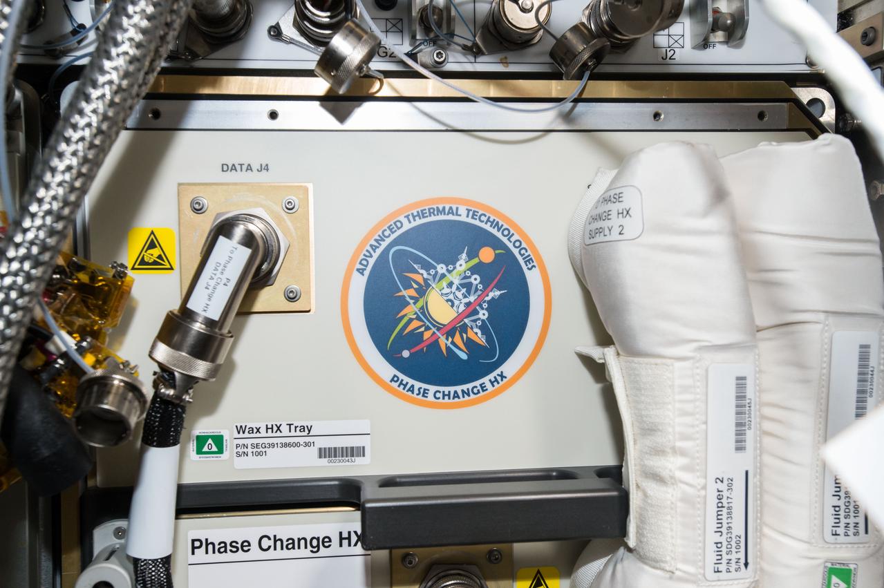 iss049e002221 (9/14/2016) --- Photographic documentation taken during installation of the Phase Change Heat Exchanger (PCHx) into EXpedite PRocessing of Experiments to Space Station (EXPRESS) Rack (ER)-8. The primary objective of the PCHx Project is to create a unique test platform utilizing the EXPRESS Rack on the ISS to advance the technology readiness level of phase change heat exchangers for infusion into future exploration vehicles.