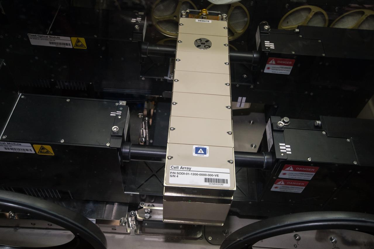 iss049e002308 (9/13/2016) --- A view taken during Selectable Optics Diagnostic Instrument (SODI) DSC Hardware Setup the MSG Work Volume. The Selectable Optical Diagnostics Instrument - Diffusion and Soret Coefficient (SODI-DSC) experiment will study diffusion in six different liquids over time in the absence of convection induced by the gravity field. The SODI-DSC investigation will provide information to scientist which can be used to more efficiently extract oil resources.