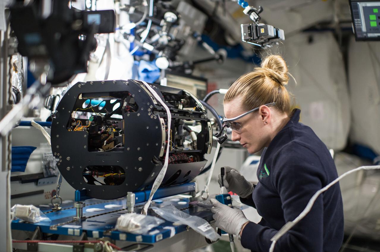 iss049e003808 (9/15/2016) --- NASA astronaut Kate Rubins is photographed replacing two Multi-user Droplet Combustion Apparatus (MDCA) Igniter Tips as part of the Combustion Integration Rack (CIR) Igniter Replacement operations. The CIR is used to perform combustion experiments in microgravity. The CIR can be reconfigured easily on orbit to accommodate a variety of combustion experiments. It consists of an optics bench, a combustion chamber, a fuel and oxidizer management system, environmental management systems, and interfaces for science diagnostics and experiment specific equipment.