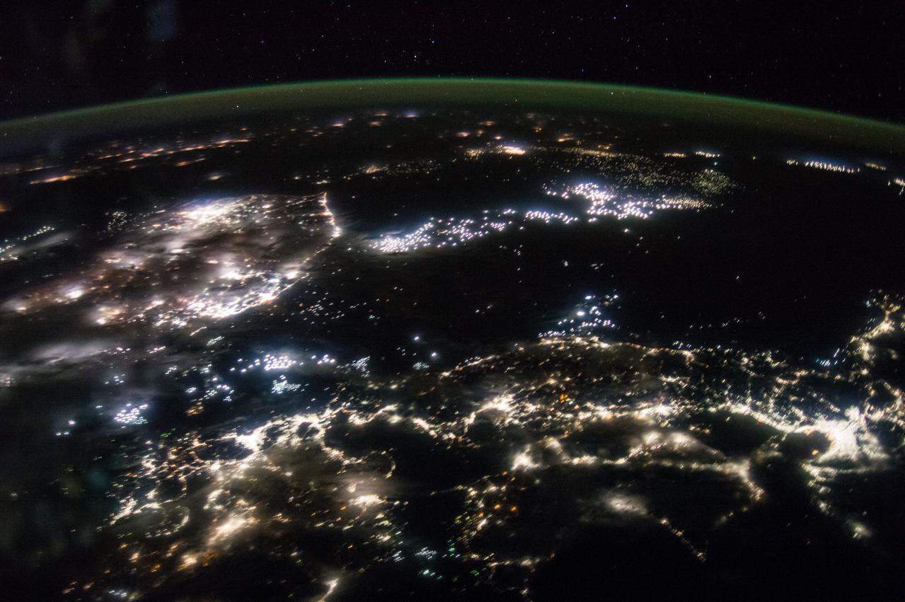 ISS049e008889  (09/23/2016) --- Night view of the Earth from the International Space Station by the crew of Expedition 49.  The land mass northwest is South Korea and south of Korea is Japan. The small dotted lights east of South Korea and north of Japan are fishing boats in the Sea of Japan.