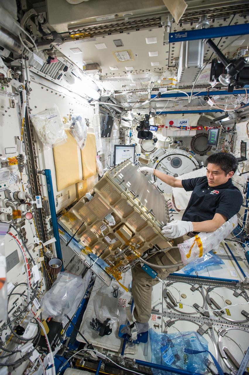 iss049e011873 (9/27/2016) --- Japan Aerospace Exploration Agency (JAXA) astronaut Takuya Onishi is photographed as he starts the first of two days of installation and preparation for the Group Combustion Module (GCM) Installation. The GCM will be installed into the Combustion Chamber.