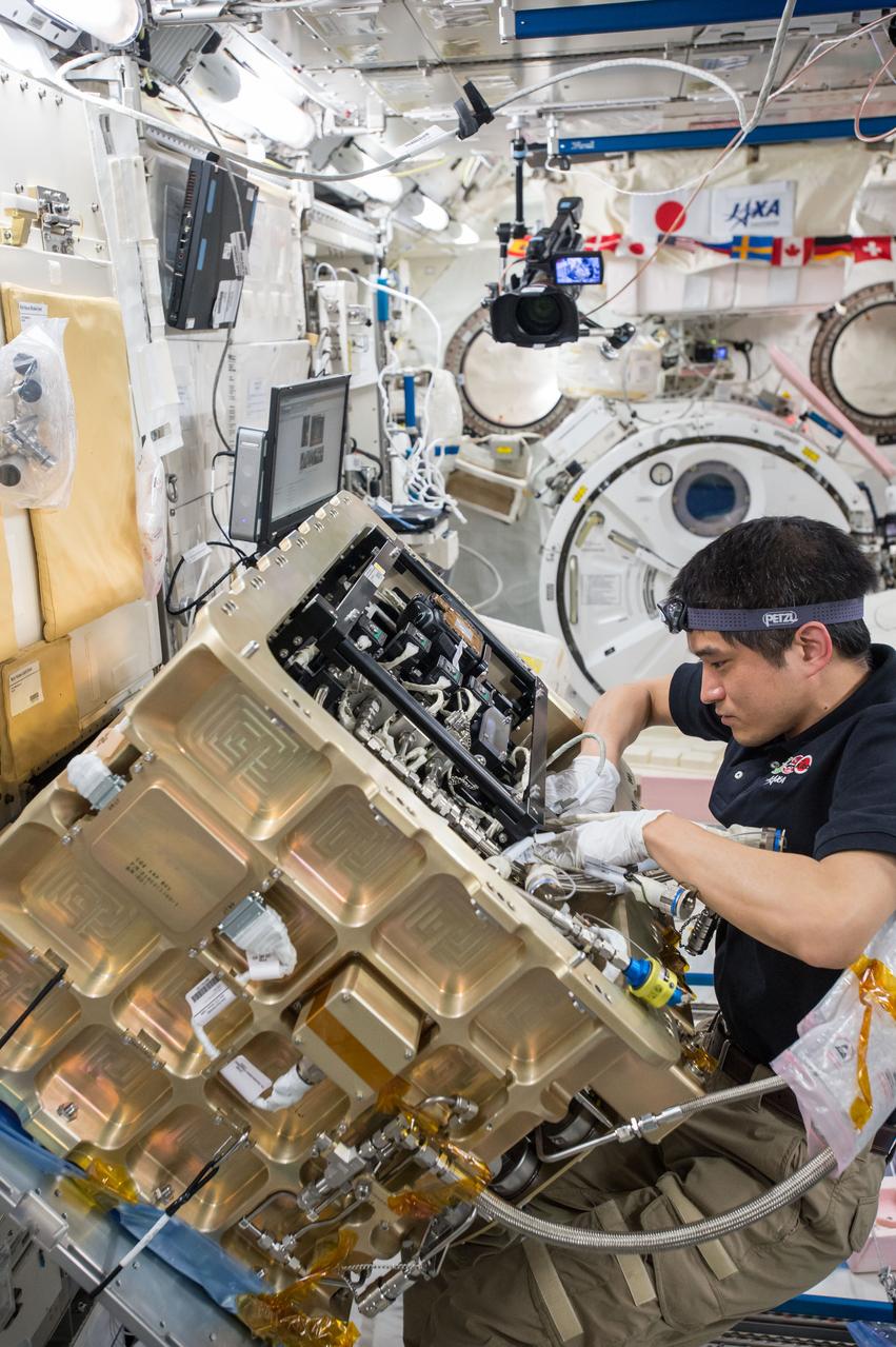 iss049e011944 (9/27/2016) --- Japan Aerospace Exploration Agency (JAXA) astronaut Takuya Onishi is photographed as he starts the first of two days of installation and preparation for the Group Combustion Module (GCM) Installation. The GCM will be installed into the Combustion Chamber.