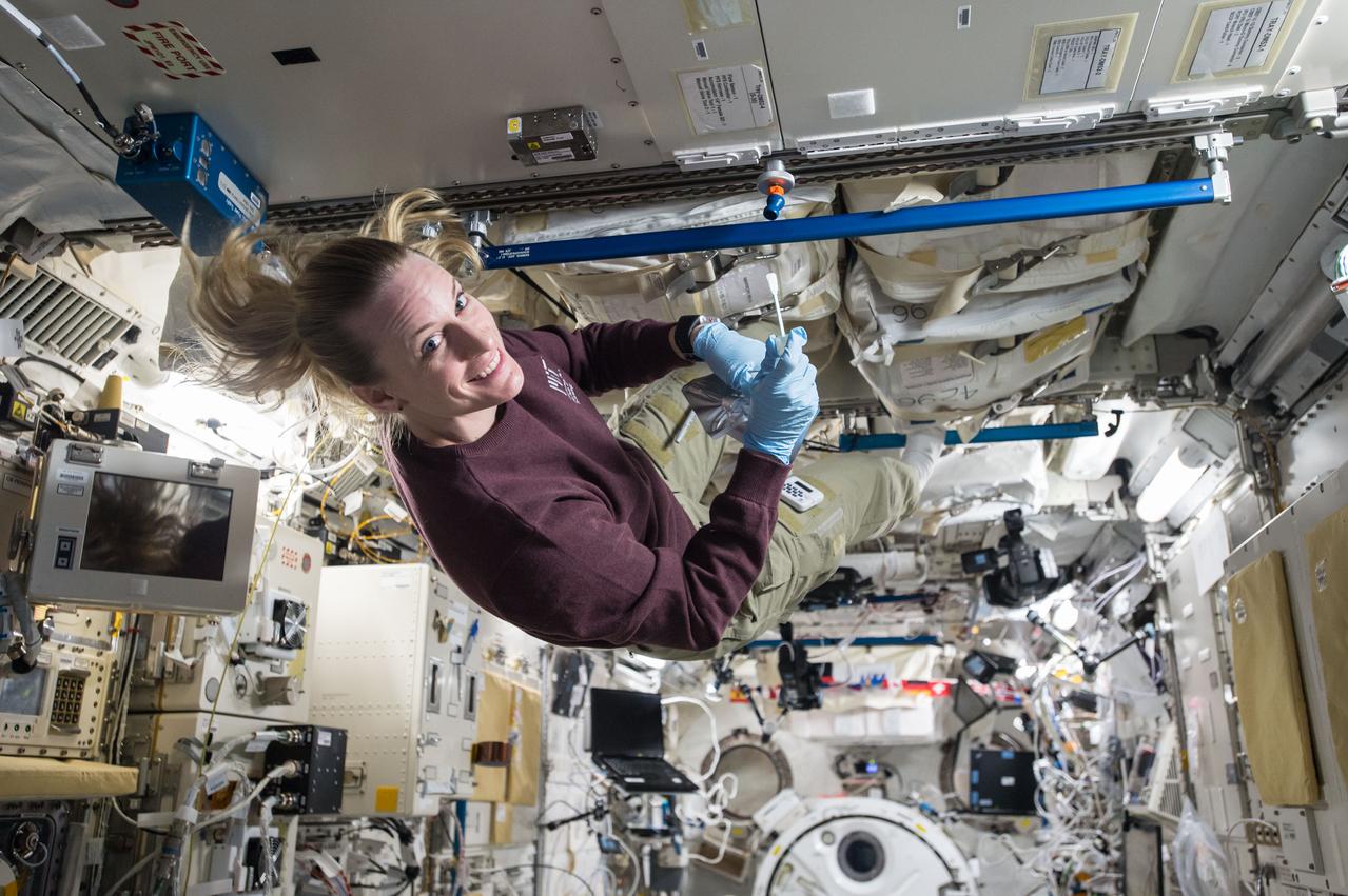 iss049e035512 (10/14/2016) --- NASA astronaut Kate Rubins during Microbe IV Sampling Sheet and White Tube Collection in the Japanese Experiment Module (JEM) Pressurized Module (JPM). The JAXA KIBO Utilization scenario, studies the relationship between humans and microbes in space habitation environments, which are critical for success in long-duration missions.