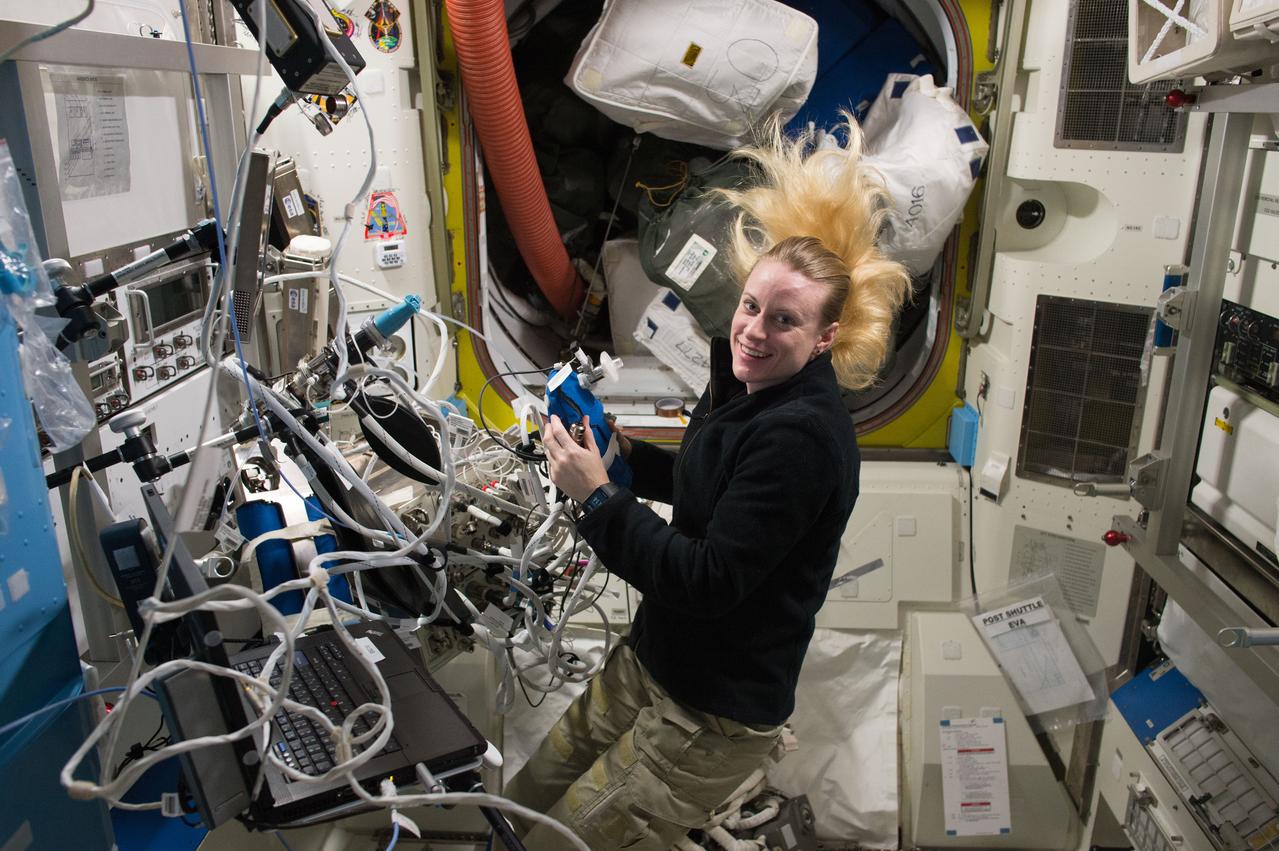 iss049e045997 (10/25/2016) --- NASA Astronaut Kate Rubins as she begans the measurement of the European Space Agency (ESA) Airway Monitoring experiment in the Quest airlock. The investigation studies the occurrence and indicators of airway inflammation in crew members to help flight surgeons plan safer, long-term missions to the moon, Mars and beyond. Results may also help doctors treat patients on Earth with asthma or other airway inflammatory diseases.