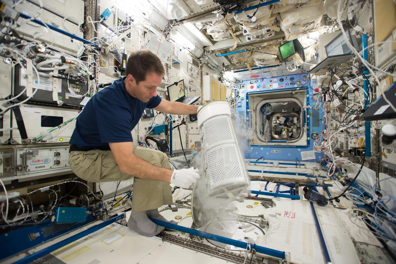 iss050e011020 (11/21/2016) --- European Space Agency (ESA) astronaut Thomas Pesquet adding MARROW samples to the Minus Eighty Laboratory Freezer for ISS (MELFI) in the Japanese Experiment Module (JEM) Pressurized Module (JPM). The MARROW study (Bone Marrow Adipose Reaction: Red Or White?) (Marrow) investigation looks at the effect of microgravity on the bone marrow.
