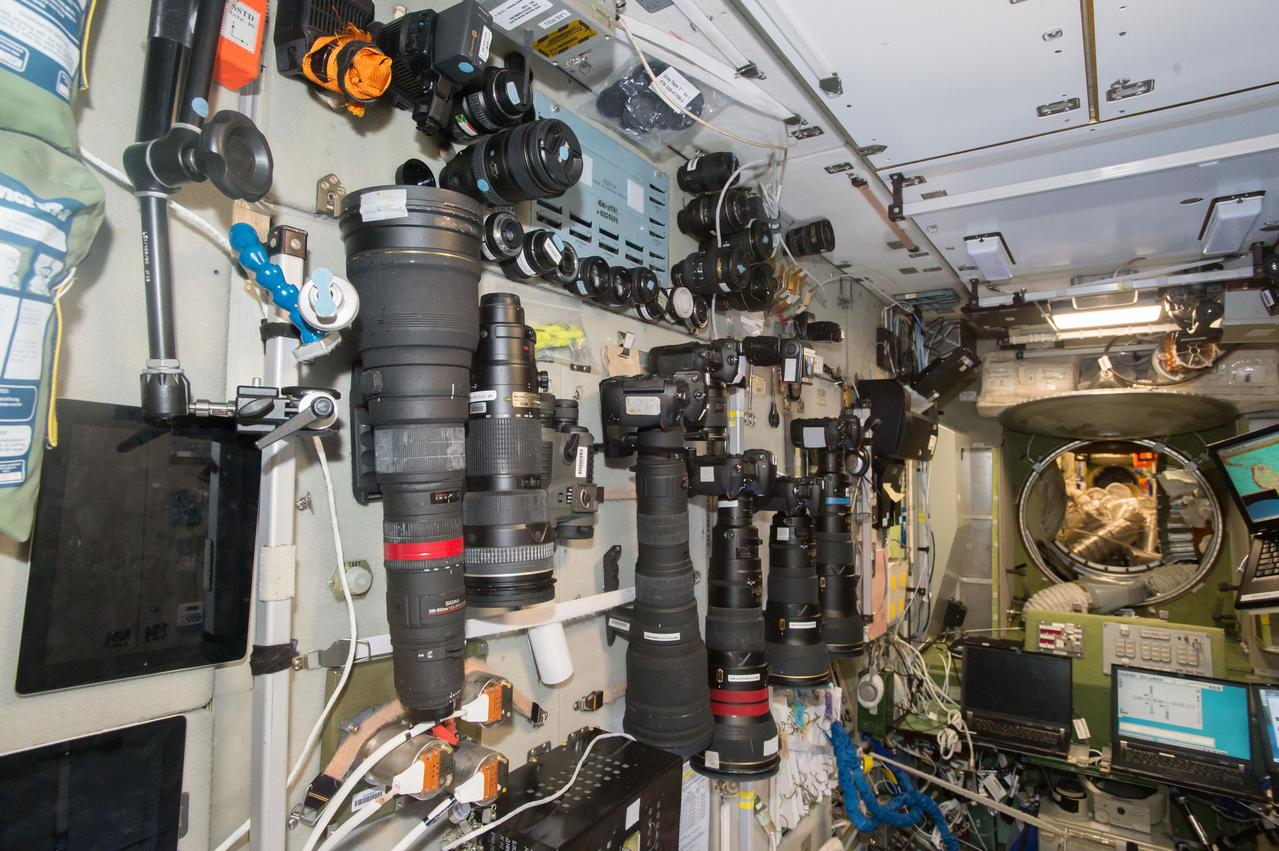 iss050e029074 (1/7/2017) --- A large selection of cameras and lenses are available to take Crew Earth Observations (CEO) photos. These cameras are in the Services Module part of the Russian Segment and near one of the windows used for Earth photography. CEO imagery provides researchers on Earth with key data to understand the planet from the perspective of the ISS. Crew members have been photographing Earth from space since the early Mercury missions beginning in 1961. The images taken from the ISS ensure this record remains unbroken.