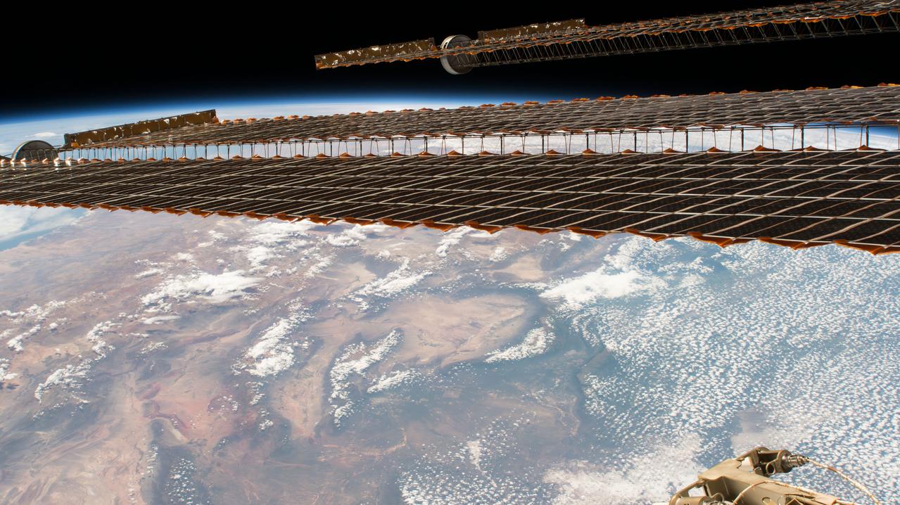 iss050e030665 (01/12/2017) --- The international Space Station (ISS) passes over South America showing Argentina, and the Southern Andes. This angled image of the ISS Solar Arrays frames the Earth scene taken by astronauts of Expedition 50.