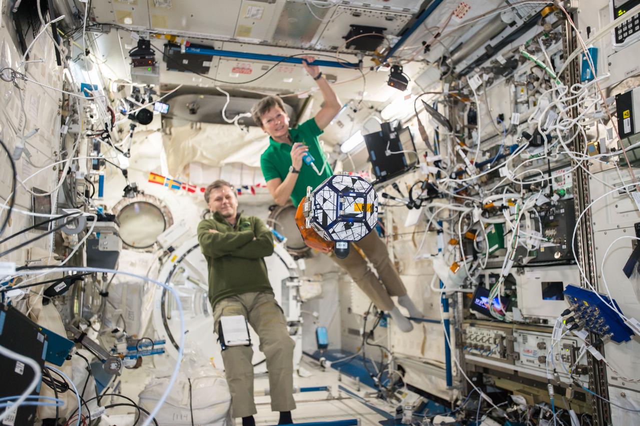 iss050e036008 (1/27/2017) --- NASA astronaut Peggy Whitson, and Cosmonaut Andrei Borisenko setting up cameras and performing Synchronized Position Hold, Engage, Reorient, Experimental Satellites (SPHERES) Zero Robotics tests, in the Japanese Experiment Module (JEM) Pressurized Module (JPM).
