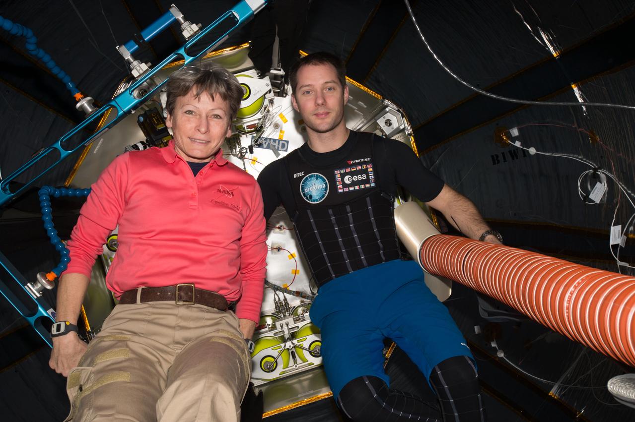 iss050e037908 (2/2/2017) --- NASA astronaut Peggy Whitson and European Space Agency (ESA) Thomas Pesquet in the Bigelow Expandable Aerospace Module (BEAM). The Bigelow Expandable Activity Module (BEAM) is an experimental expandable capsule that docks with the International Space Station (ISS). After docking, BEAM inflates to roughly 13 feet long and 10.5 feet in diameter to provide a habitable volume where a crew member can enter.
