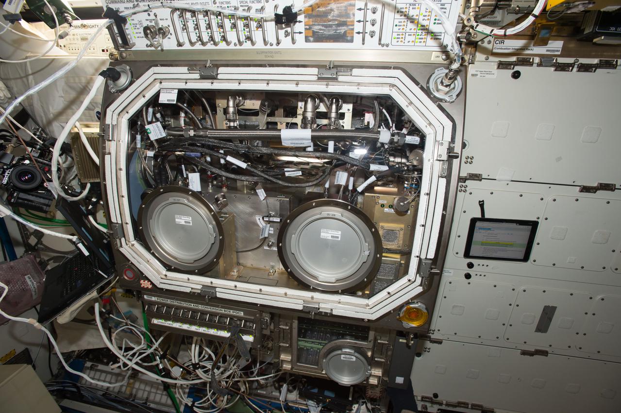 iss050e040296 (2/10/2017) --- View during the Packed Bed Reactor Experiment (PBRE) removal from the Microgravity Science Glovebox (MSG), in the U.S. Laboratory. Photo was taken during Expedition 50.