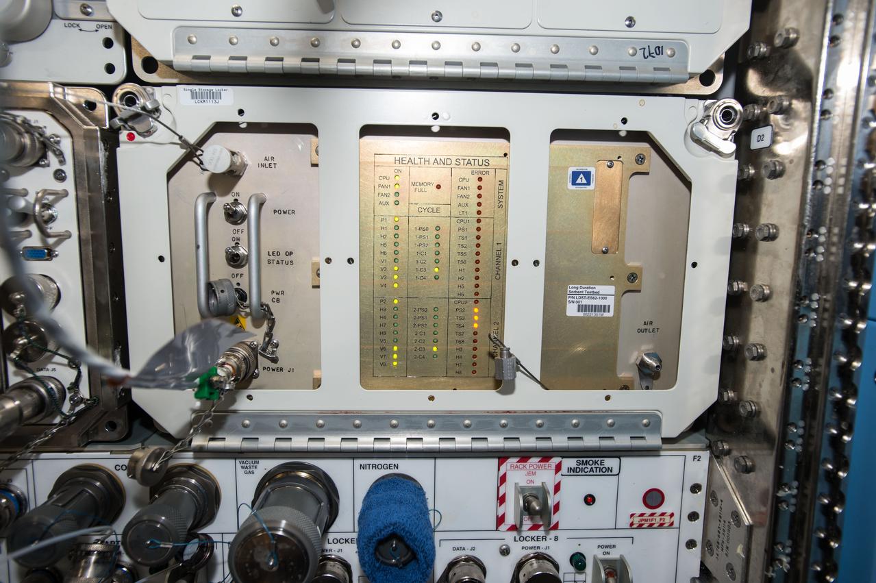 iss050e053932 (3/3/2017) --- A view of Long Duration Sorbent Testbed during Inlet Filter change. The Long Duration Sorbent Testbed (LDST) investigation exposes desiccants and CO2 sorbents to the ISS atmosphere for an extended period (such as one year) before returning them to earth for analysis of contamination level and capacity loss. The results will determine which types of sorbents would be most effective on long-term missions to Mars or other destinations.