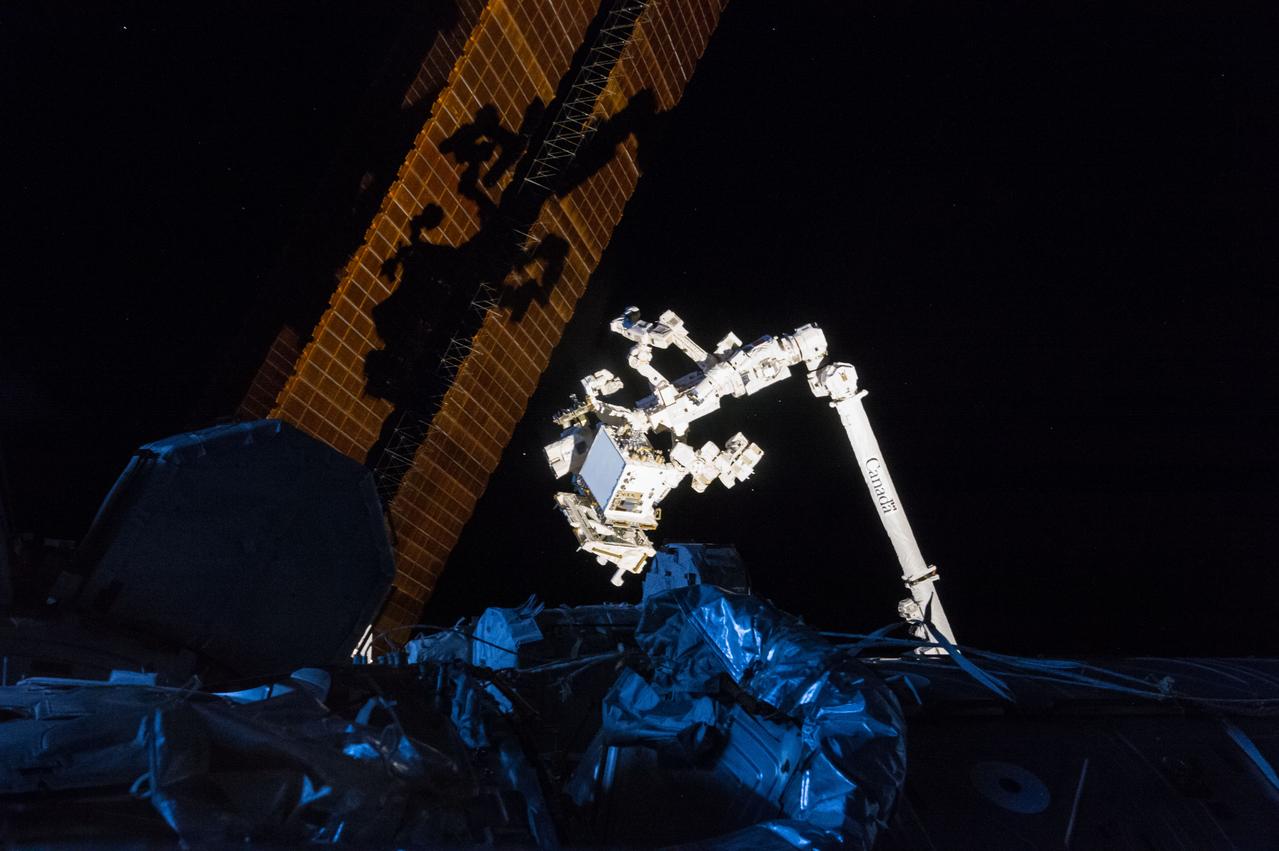 iss050e056301 (3/8/2017) --- A view of the Space Station Remote Manipulator System (SSRMS) during Robotic Refueling Mission-Phase 2 (RRM-P2) operations. NASA's Robotic Refueling Mission (RRM) is an external International Space Station (ISS) investigation that demonstrates and tests the tools, technologies and techniques needed to robotically refuel, repair, and upgrade satellites in space, especially satellites that were not designed to be serviced. A joint effort between NASA and the Canadian Space Agency (CSA), RRM is the first in-orbit attempt to test robotic refueling and servicing techniques for spacecraft not built with in-orbit servicing in mind.