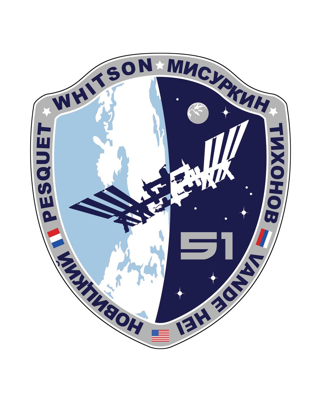 ISS051-S-001 --- From as early as the 11th century, coats of arms have been used as emblems representing groups as small as families to as large as countries.  The Expedition 51 patch is designed as a modernized international coat of arms, blending the traditional shield shape with our modernized symbol of achievement, the International Space Station. The background represents our home world and its inhabitants on the left, and outer space to the right.  The bi-color International Space Station is the bridge between the two, symbolizing the benefits on Earth of space research, and at the same time our mission to explore deeper into space, on a path to further discovery and knowledge.