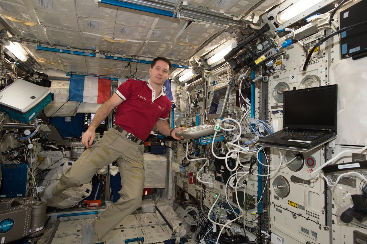 iss051e019007 (April 18, 2017) --- European Space Agency astronaut Thomas Pesquet works inside the Columbus laboratory module.