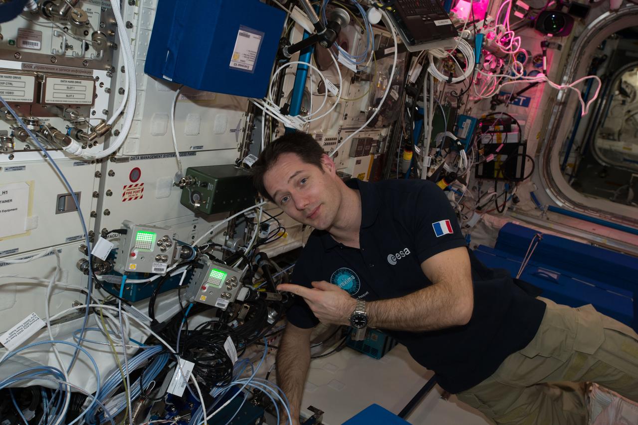 iss051e029182 (4/27/2017) --- European Space Agency (ESA) astronaut Thomas Pesquet poses for a photo next to AstroPi Raspberry Pi computers equipped with Visual and Infrared Cameras. Image was taken in the Columbus European Laboratory. The activities related to this project are intended to encourage and strengthen the teaching of computing and coding curriculums, and through this stimulate the curiosity of students and motivate them towards further study of STEM (Science, Technology, Engineering and Mathematics) subjects.