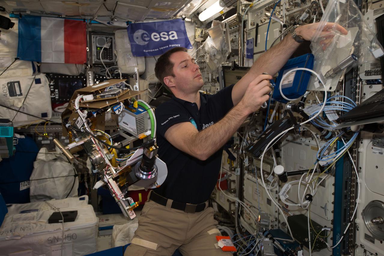 iss051e033992 (May 2, 2017) --- Astronaut Thomas Pesquet, of the European Space Agency (ESA), is at work inside the Columbus laboratory module developed by ESA.
