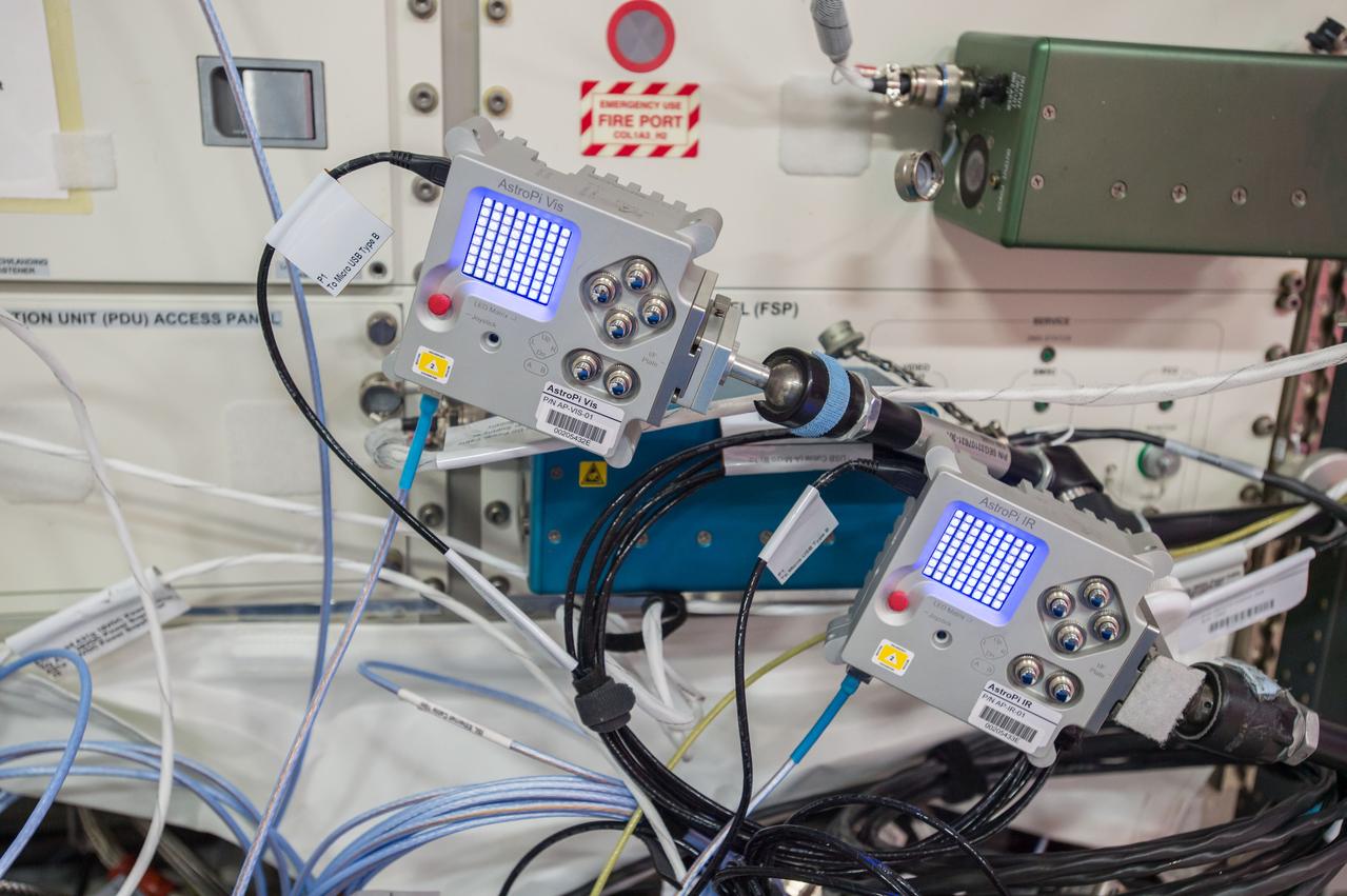 iss051e037888 (5/4/2017) --- A view of two AstroPi Raspberry Pi computers,  one equipped with a Visual camera and the other with an Infrared Camera in the Columbus module aboard the International space Station (ISS).