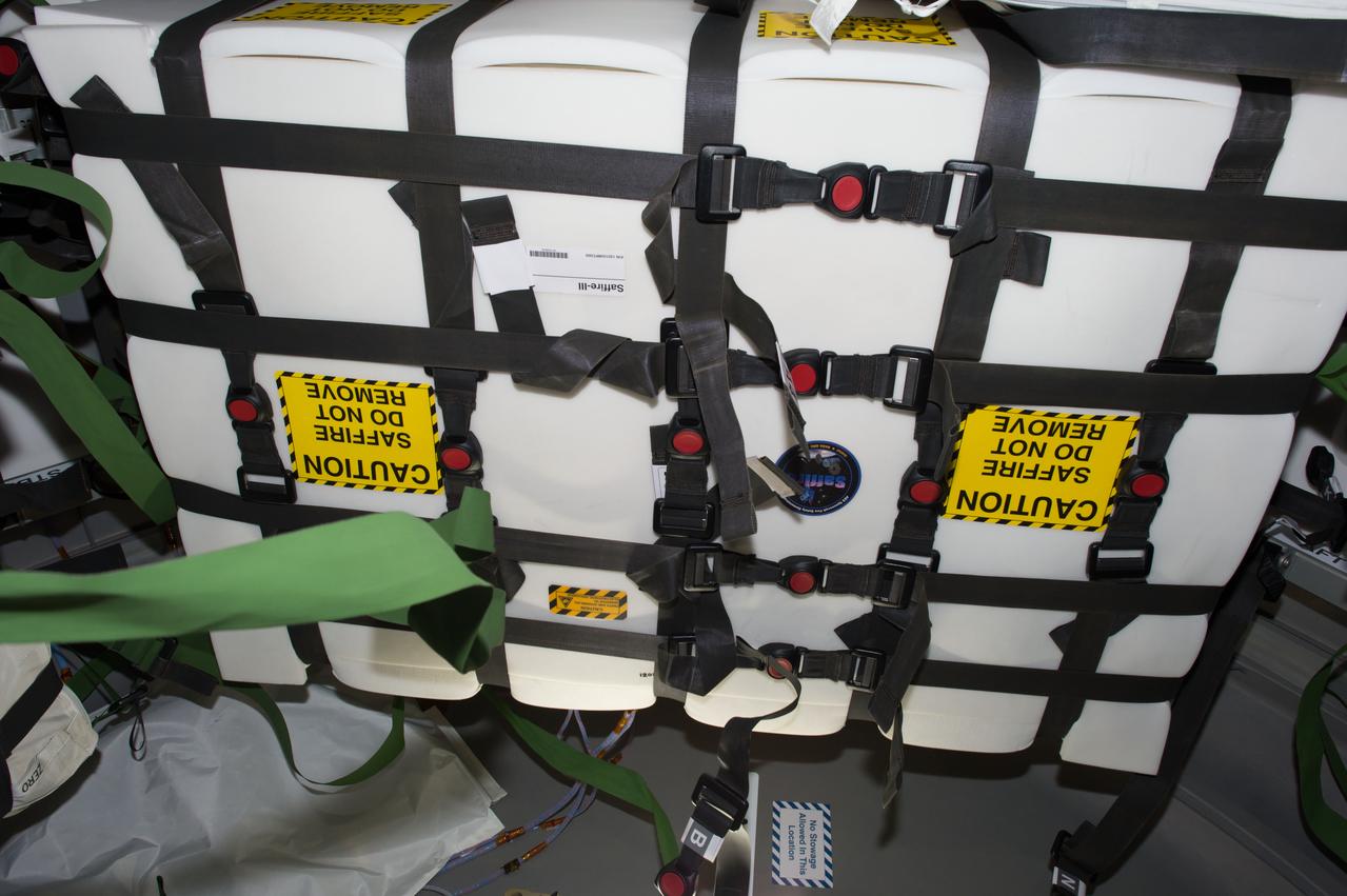 iss051e039882 (5/8/2017) --- A view of Spacecraft Fire Experiment-III (Saffire-III) award the John Glenn Orbital ATK 7 (OA-7) Cygnus spacecraft, taken during cargo transfer operations (OPS). The NASA Advanced Exploration Systems program began a project to develop and demonstrate spacecraft fire safety technologies in relevant environments. The keystone of these demonstrations is a large-scale fire safety experiment conducted on an International Space Station (ISS) re-supply vehicle after it has undocked from the ISS and before it enters the atmosphere.