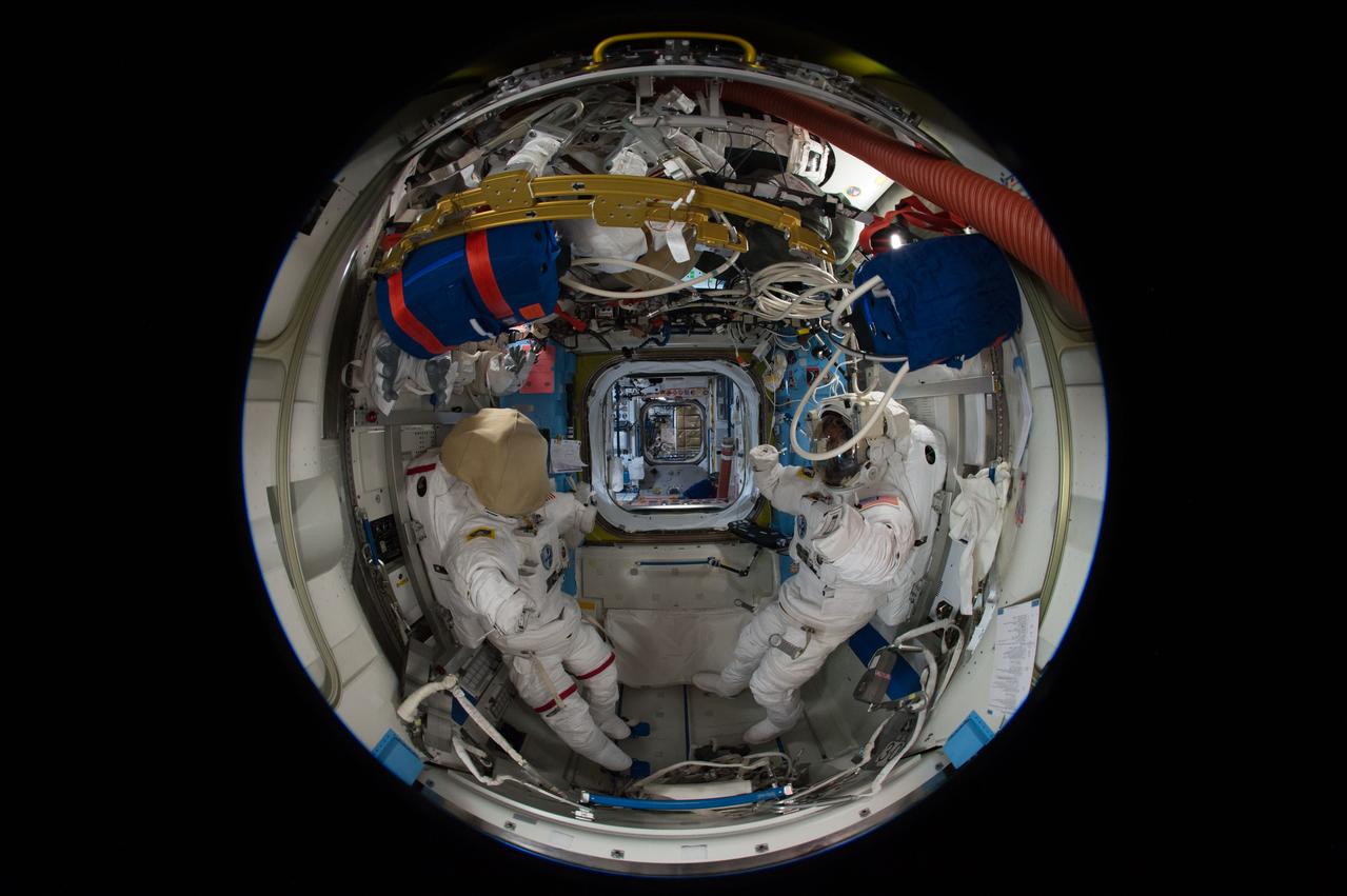 iss051e041018 (5/11/2017) --- A fish-eye view looking port in the Quest Airlock (A/L), taken for a Google Street View of the ISS. The port hatch into the Unity Node 1 is in view.