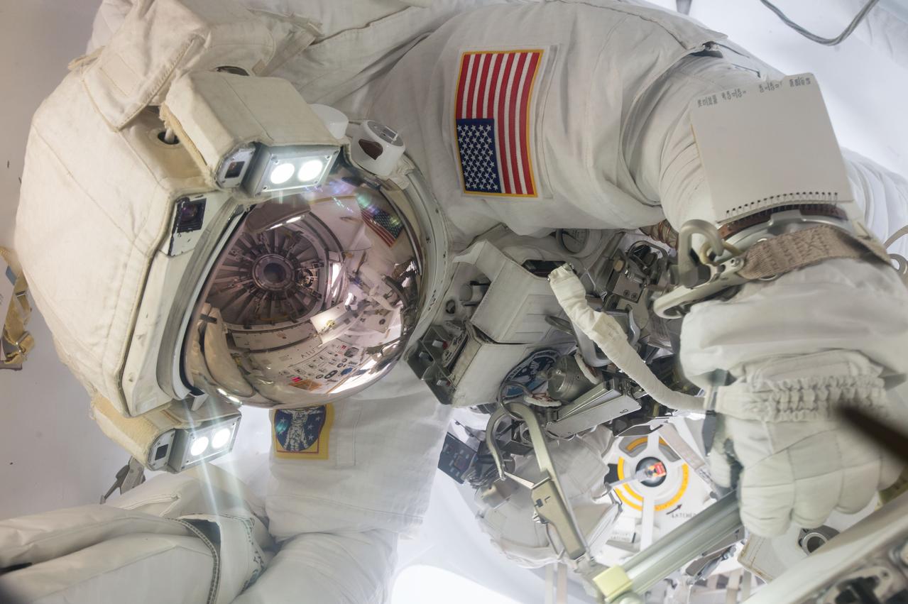 iss051e041189 (May 12, 2017) --- Air Force colonel and NASA astronaut Jack "2Fish" Fischer is suited up in a U.S. spacesuit inside the crew lock portion of the U.S. Quest airlock. Fischer and Expedition 51 Commander Peggy Whitson had participated in the 200th spacewalk in support of International Space Station assembly and maintenance.