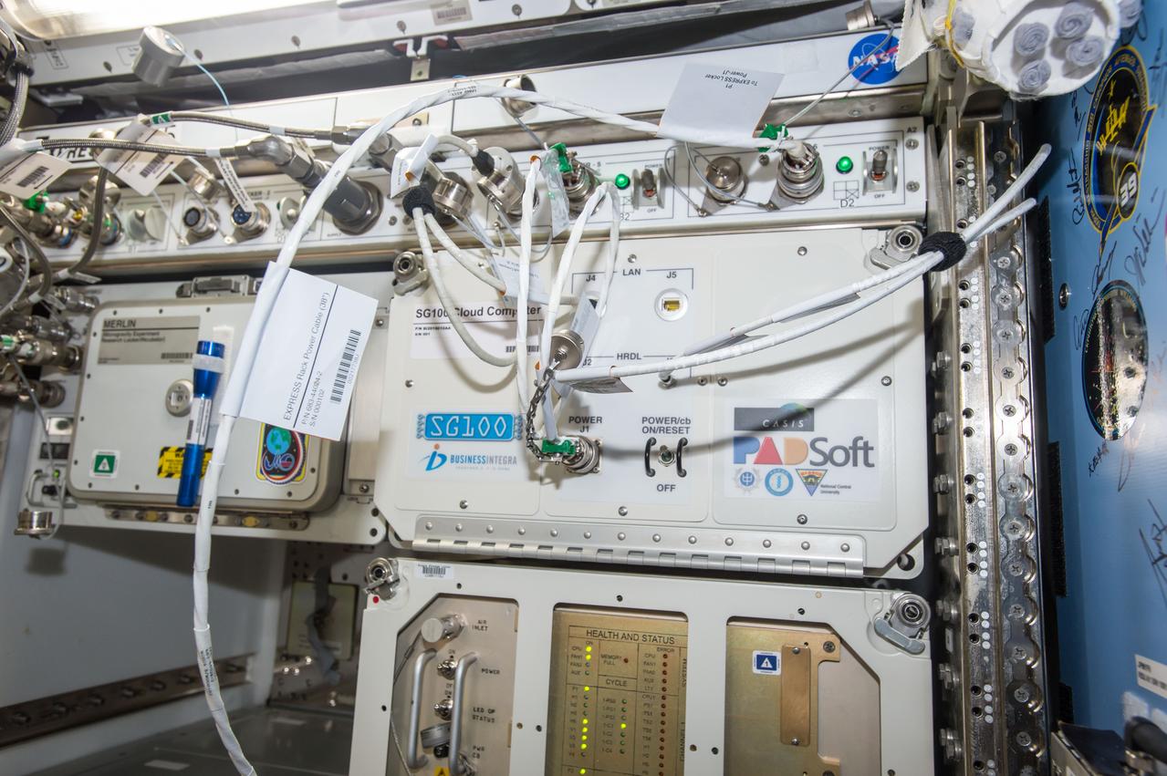 iss051e045046 (5/17/2017) --- The SG100 Cloud Computing Payload, shown here installed in the Kibo Japanese Pressurized Module (JPM) aboard the International Space Station (ISS), tests a space-rated, single-board computer designed to allow engineers, scientists and researchers to perform significant amounts of onboard analysis prior to downlink to the ground.