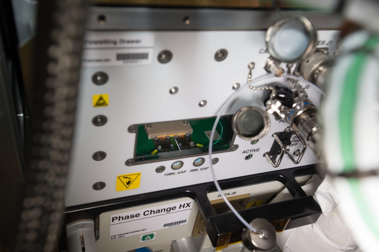 iss051e049793 (5/25/2017) --- A view of the Electrowetting Drawer taken during Passive Thermal Flight Experiment operations (OPS) in the Kibo Japanese Experiment Pressurized Module (JPM) aboard the International Space Station (ISS). The Advanced Passive Thermal eXperiment (APTx) tests three advanced thermal management technologies. It demonstrates the in-space performance of each, an important step toward improving these technologies for use on future space exploration missions.