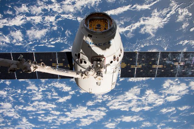 NASA image: SpaceX-11 Dragon capture for docking