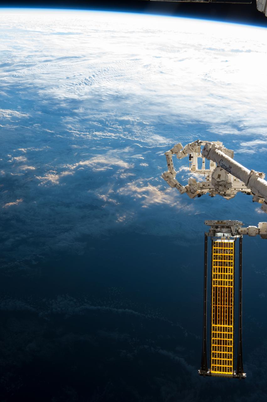 iss052e004379 (6/18/2017) --- The Roll-Out Solar Array (ROSA) is a new type of solar panel that rolls open in space like a party favor and is more compact than current rigid panel designs. The ROSA investigation tests deployment and retraction, shape changes when the Earth blocks the sun, and other physical challenges to determine the array’s strength and durability. ROSA has the potential to replace solar arrays on future satellites, making them more compact and lighter weight. Satellite radio and television, weather forecasting, GPS and other services used on Earth would all benefit from high-performance solar arrays.