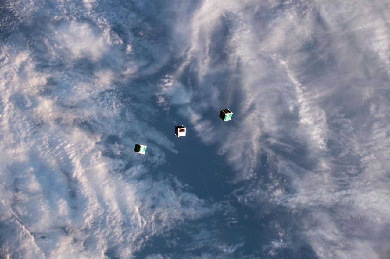 iss052e011205 (7/7/2017) --- A view taken of CubeSats from Japan, Ghana, Mongolia, Bangladesh and Nigeria deployed from the Japanese Experiment Module (JEM) Satellite Orbital Deployer 7 (J-SSOD 7) (with Earth visible in the background). These satellites are part of the Joint Global Multi-Nation Birds Satellite project (BIRDS-1), a cross-border interdisciplinary satellite project for non-space faring countries supported by Japan. During this 2-year project, students from the Graduate School of Engineering of the Kyushu Institute of Technology design, develop and operate CubeSats belonging to the five participating countries.