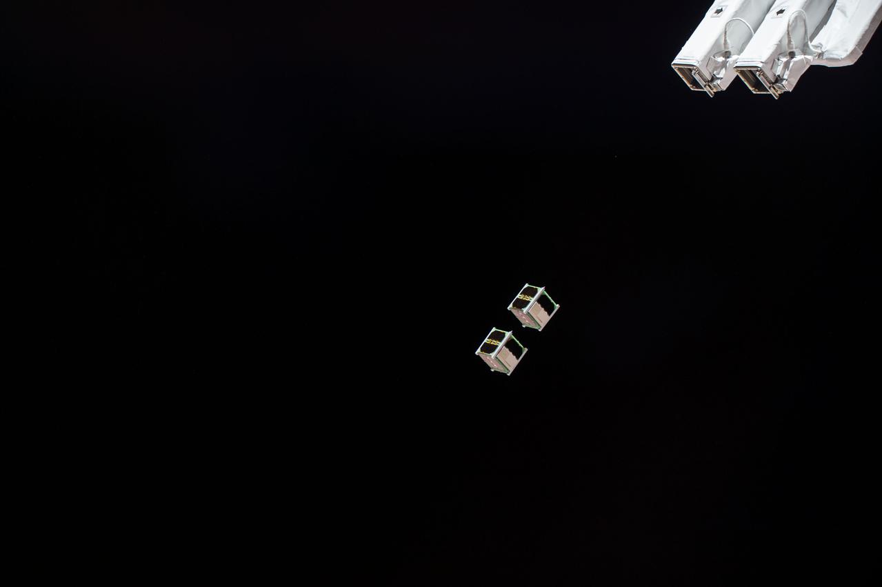 iss052e011289 (7/7/2017) --- A view taken of CubeSats from Japan, Ghana, Mongolia, Bangladesh and Nigeria deployed from the Japanese Experiment Module (JEM) Satellite Orbital Deployer 7 (J-SSOD 7) (with Earth visible in the background). These satellites are part of the Joint Global Multi-Nation Birds Satellite project (BIRDS-1), a cross-border interdisciplinary satellite project for non-space faring countries supported by Japan. During this 2-year project, students from the Graduate School of Engineering of the Kyushu Institute of Technology design, develop and operate CubeSats belonging to the five participating countries.