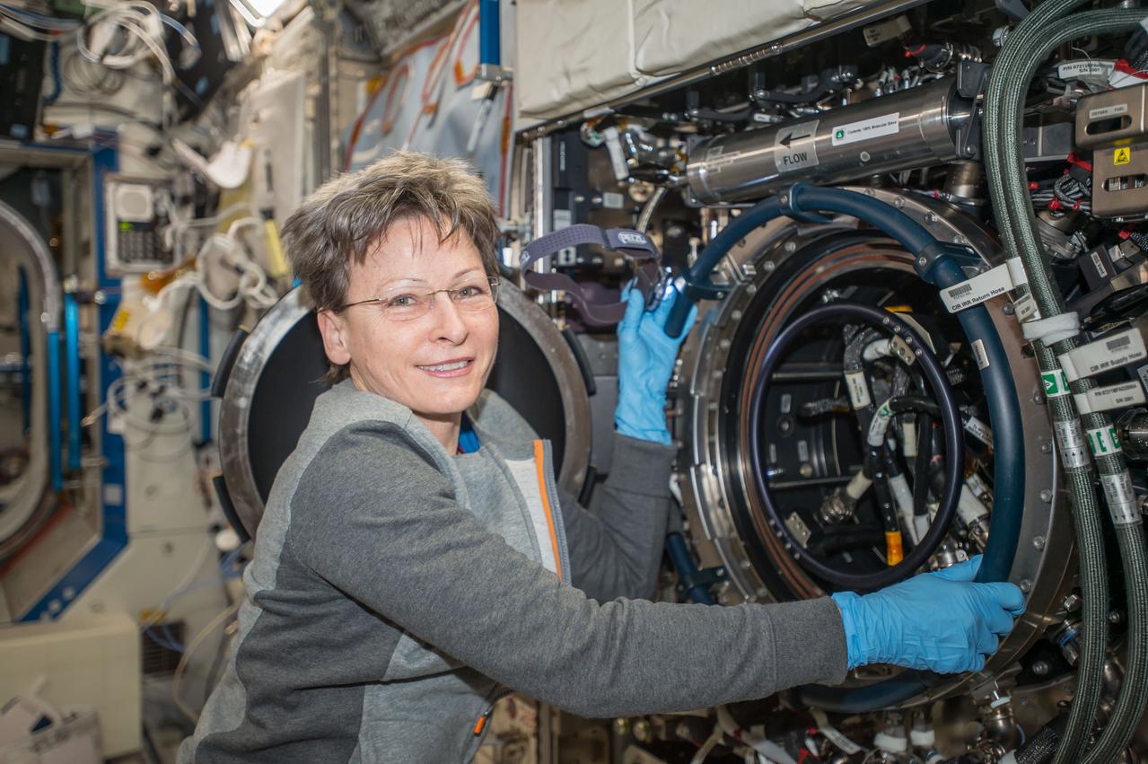 iss052e027048 (Aug. 4, 2017) --- Astronaut Peggy Whitson works on the Combustion Integrated Rack in the U.S. Destiny laboratory module.