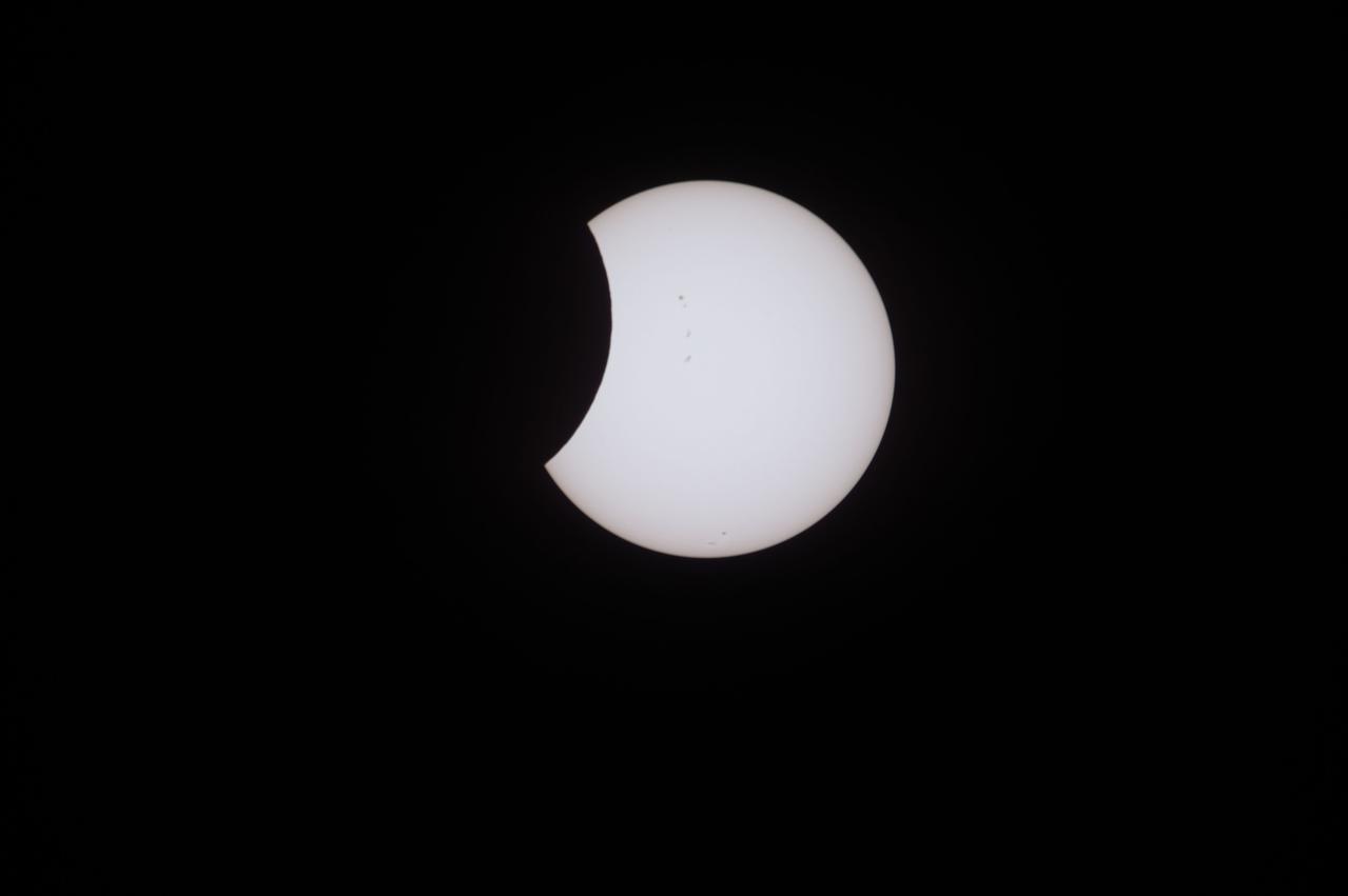 iss052e055851 (Aug. 21, 2017) --- Aboard the International Space Station, NASA Flight Engineer Randy Bresnik took still images of the eclipse as seen from the unique vantage of the Expedition 52 crew. Witnessing the eclipse from orbit with Bresnik were NASA’s Jack Fischer and Peggy Whitson, ESA (European Space Agency’s) Paolo Nespoli, and Roscosmos’ Commander Fyodor Yurchikhin and Sergey Ryazanskiy. The space station crossed the path of the eclipse three times as it orbited above the continental United States at an altitude of 250 miles