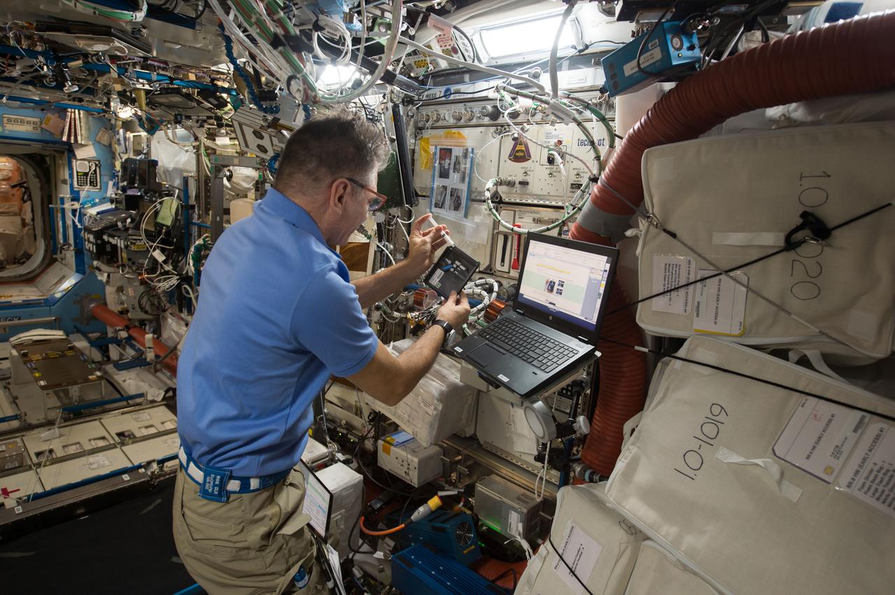 iss052e058893 (8/18/2017) --- European Space Agency (ESA) astronaut Paolo Nespoli collects and processes saliva samples in the bioanalyzer for the ISS Non-invasive Sample Investigation and Results Transmission to ground with the Utmost easiness (In Situ). Crew on the International Space Station (ISS) are continually monitored for health changes, and as part of these measurements, they take saliva samples that are stored and returned to Earth later. The ISS Non-invasive Sample Investigation and results Transmission to ground with the Utmost easiness (IN SITU) bioanalysis is a portable device that can check crew members’ saliva on board, enabling direct real-time analysis. The device’s first uses are to monitor stress levels and appetites among crew members