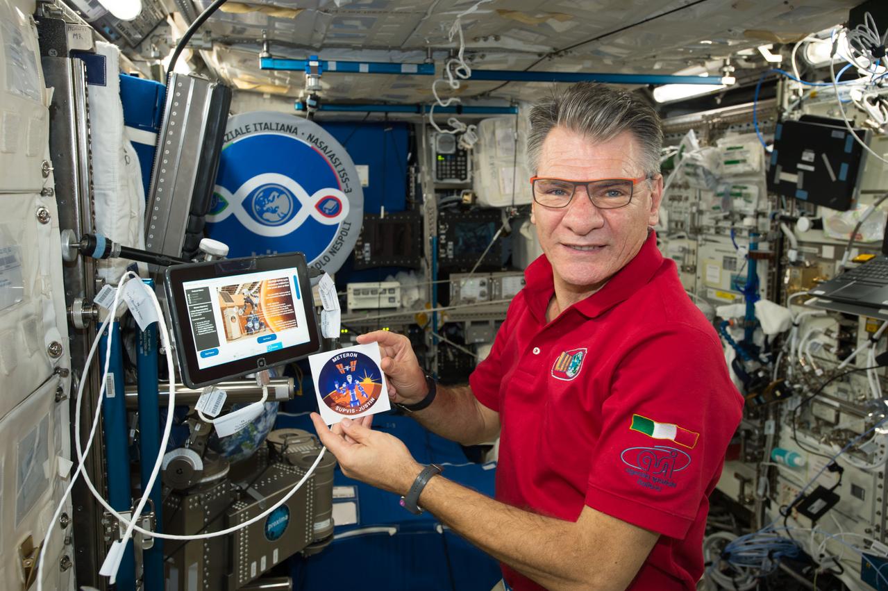 iss052e075356 (8/25/2017) --- European Space Agency (ESA) astronaut Paolo Nespoli is photographed performing protocol operation for ESA’s SUPVIS-Justin investigation. SUPVIS-Justin, part of the Meteron program, aims to demonstrate that an astronaut on an orbiting space station can command a robot via a tablet PC to perform complex tasks on a planetary surface. The SUPVIS Justin experiment includes an extended supervised autonomy concept: the crew gives high level commands to the robot, which then uses its local intelligence and decision-making capability to execute a task independently, according to pre-programmed algorithms. In this sense, the responsibility of decision-making is shared between the crew and the robot. External Caption