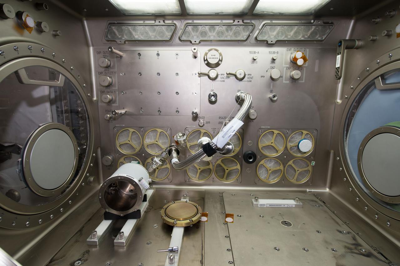 iss052e075807 (Aug. 30, 2017) --- Eli Lily-Lyophilization hardware setup in the Migrogravity Science Glovebox (MSG) work volume. Eli Lily-Lyophilization examines freeze-drying processes in the microgravity environment aboard the International Space Station (ISS) to improve the understanding of how food, drugs and other compounds are preserved in space.