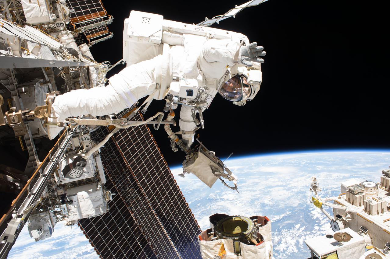 iss053e095794 (Oct. 10, 2017) --- NASA astronaut and Expedition 53 Flight Engineer Mark Vande Hei is pictured during a spacewalk to service components on the Canadarm2 robotic arm during a spacewalk with NASA astronaut Randy Bresnik (out of frame).