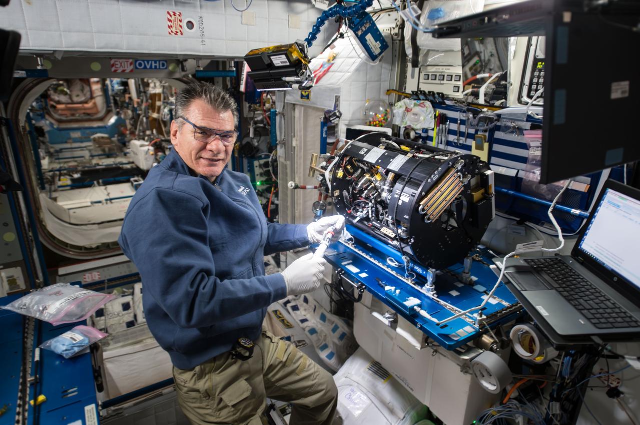 iss053e098185 (Oct. 12, 2017) --- Flight Engineer Paolo Nespoli works inside the Harmony module to configure the Combustion Integrated Rack and enable the Advanced Combustion Microgravity Experiment (ACME). The primary and secondary goals of ACME are the improved fuel efficiency and reduced pollutant production in practical combustion on Earth, and spacecraft fire prevention through innovative research focused on materials flammability.