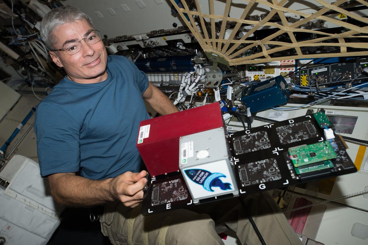 iss053e105442 (Oct. 17, 2017) --- Flight Engineer Mark Vande Hei swaps out a payload card from the TangoLab-1 facility and places into the TangoLab-2 facility. TangoLab provides a standardized platform and open architecture for experimental modules called CubeLabs. CubeLab modules may be developed for use in 3-dimensional tissue and cell cultures.