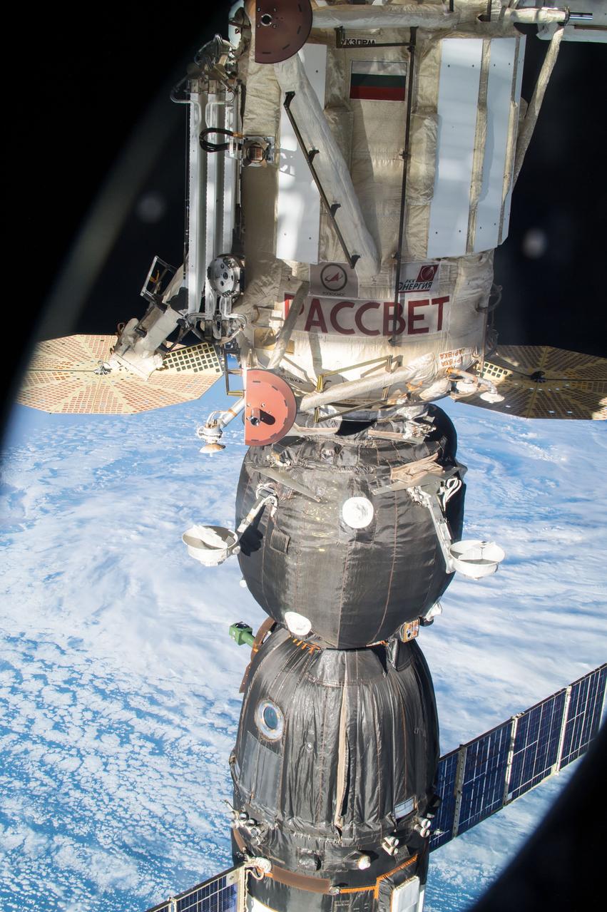 iss053e210873 (Nov. 16, 2017) --- The Soyuz MS-05 crew spacecraft is pictured docked to the Rassvet Mini-Research Module-1. Pictured behind the Soyuz spacecraft and its docking port are the dual cymbal-like UltraFlex solar arrays that power the Orbital ATK Cygnus resupply ship.