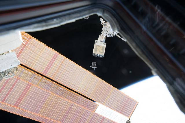 NASA image: NanoRack Cubesat Deployer (NRCSD) #13 Deploy