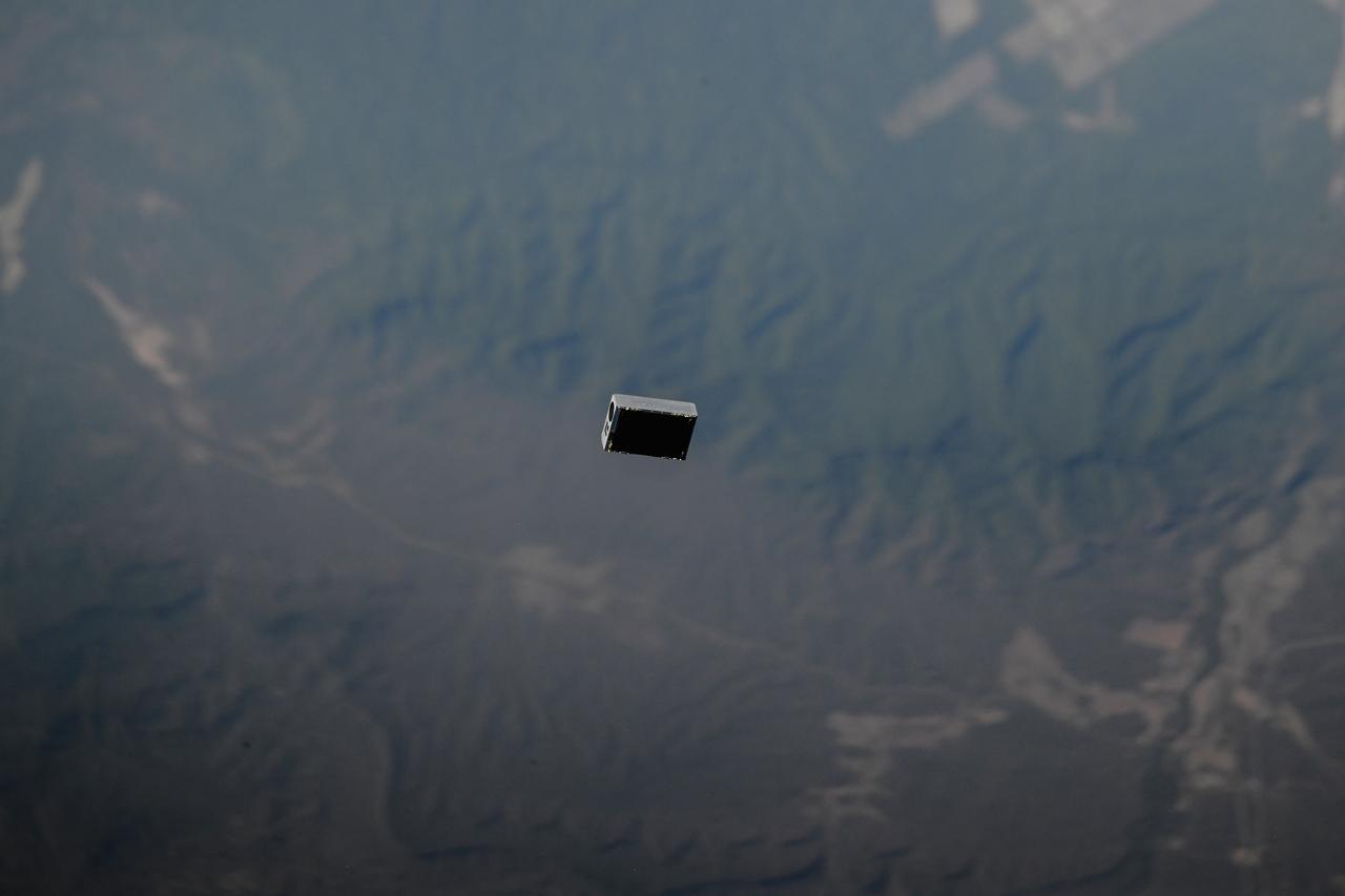 iss053e470644 (11/20/2017) --- A view of the Asteria Satellite moments after deployment from the International Space Station (ISS). The Arcsecond Space Telescope Enabling Research in Astrophysics (ASTERIA) is a six-unit (6U) CubeSat deployed from the ISS that tests new technologies for astronomical observation, such as the detection of planets outside our solar system (a.k.a., exoplanets).