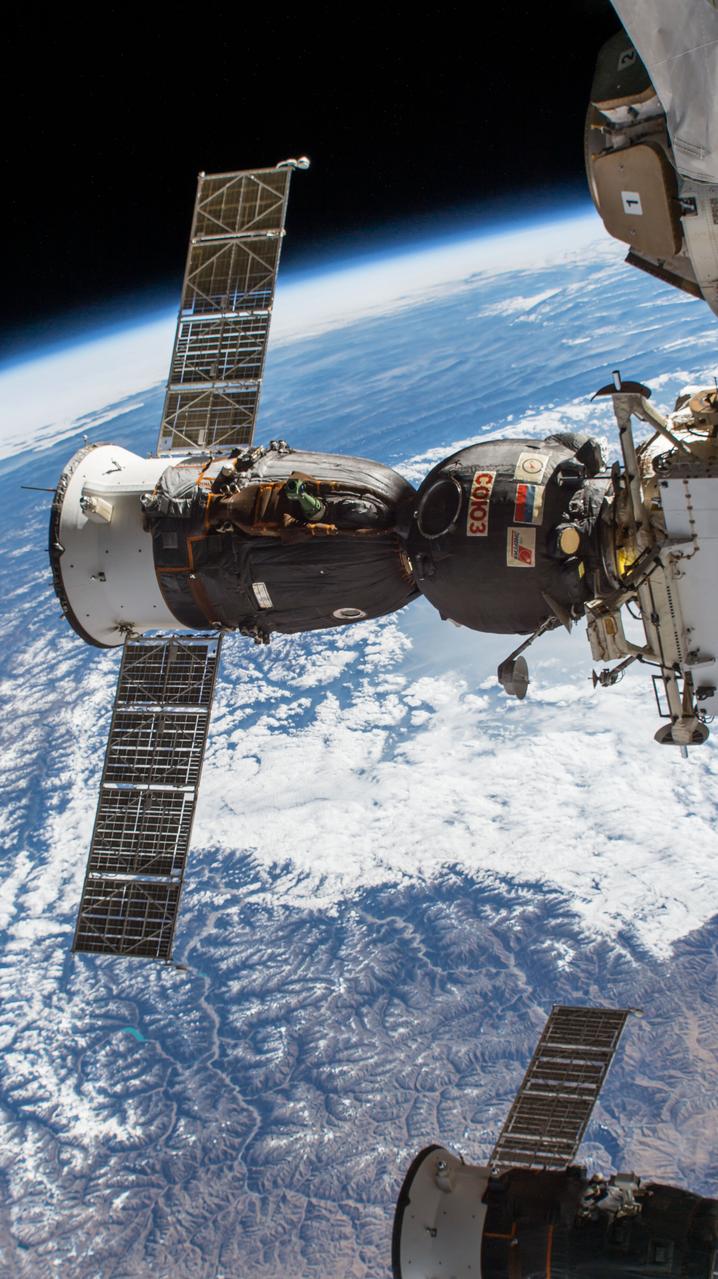 iss054e000136 (Dec. 14, 2017) --- The Soyuz MS-05 spacecraft that brought home Expedition 53 crew members Randy Bresnik of NASA, Sergey Ryazanskiy of Roscosmos and Paolo Nespoli of the European Space Agency, is pictured moments before undocking from the Rassvet module.