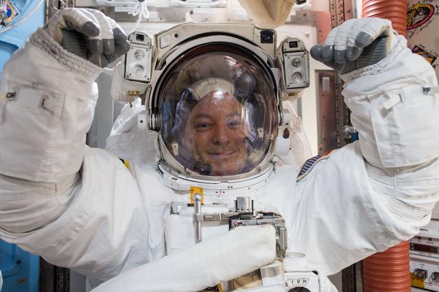 NASA image: NASA astronaut Scott Tingle wears a U.S. spacesuit