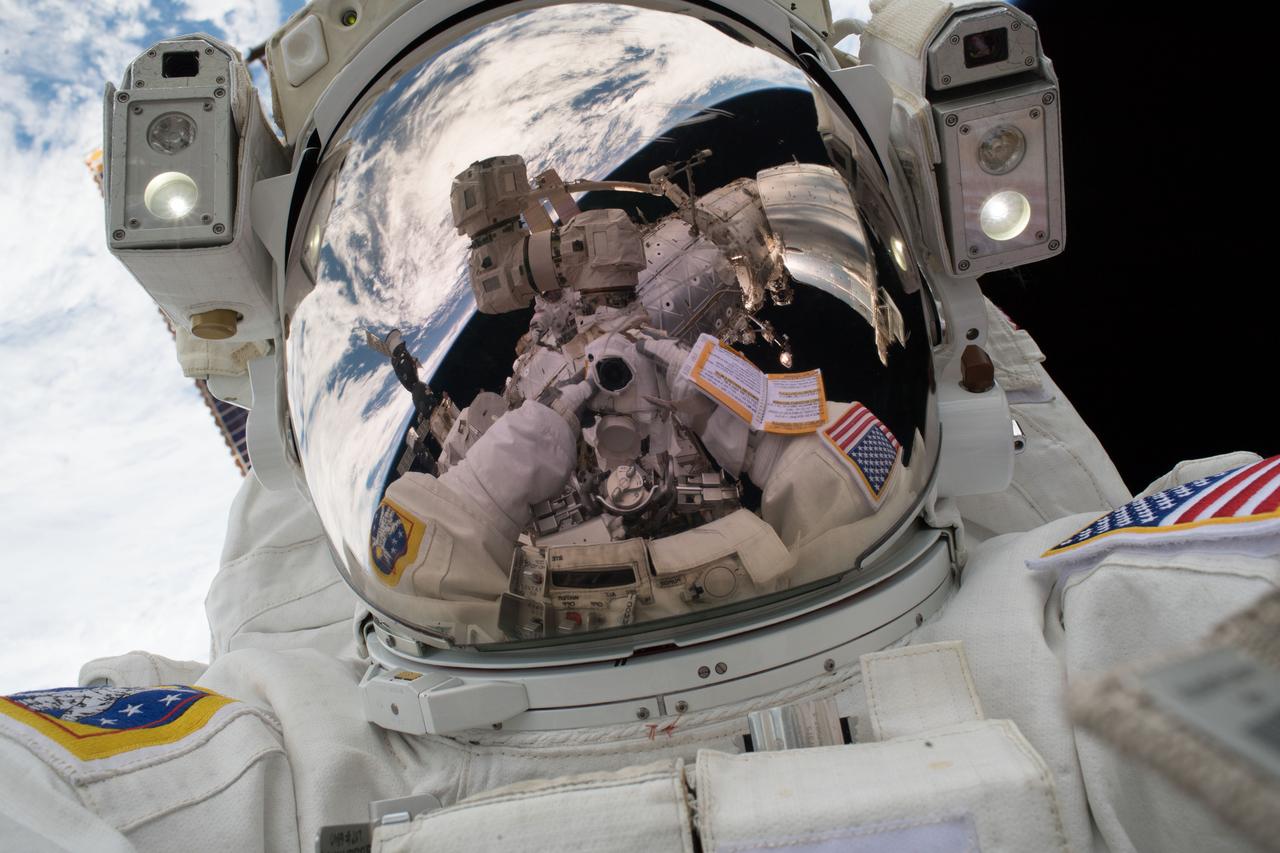 iss054e022843 (Jan. 23, 2018) --- Spacewalker Mark Vande Hei took his own photograph during the first spacewalk of 2018. These sky-high pictures are better known as “space-selfies.”