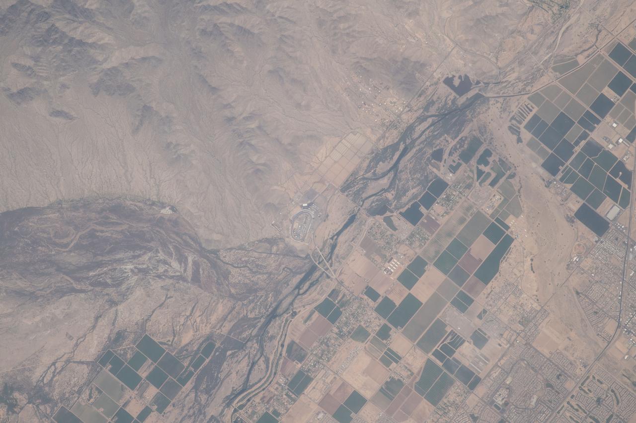 iss055e012512 (April 6, 2018) --- The Phoenix International Raceway is seen in this near overhead shot above Phoenix, Arizona from the International Space Station.