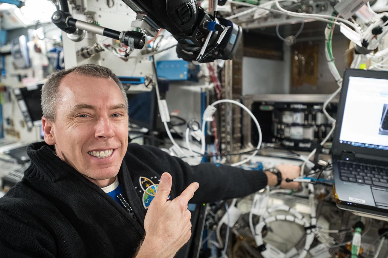 iss055e018689 (April 11, 2018) --- NASA astronaut Drew Feustel conducts science operations using the Multi-Use Variable-G Platform that enables research into smaller and microscopic organisms.
