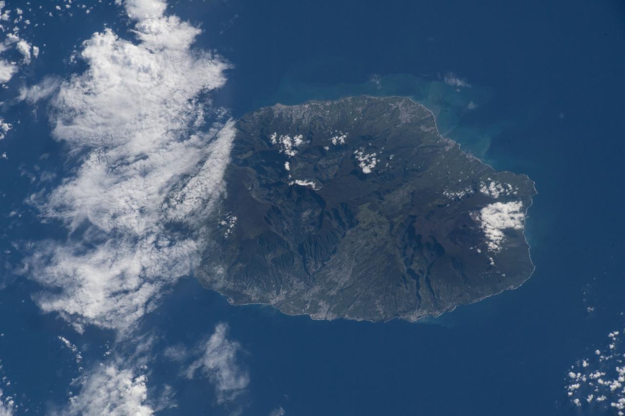 iss055e020372 (April 10, 2018) --- Reunion Island, a French region off the coast of Madagascar, was pictured by an Expedition 55 crew member as the International Space Station orbited over the Indian Ocean.