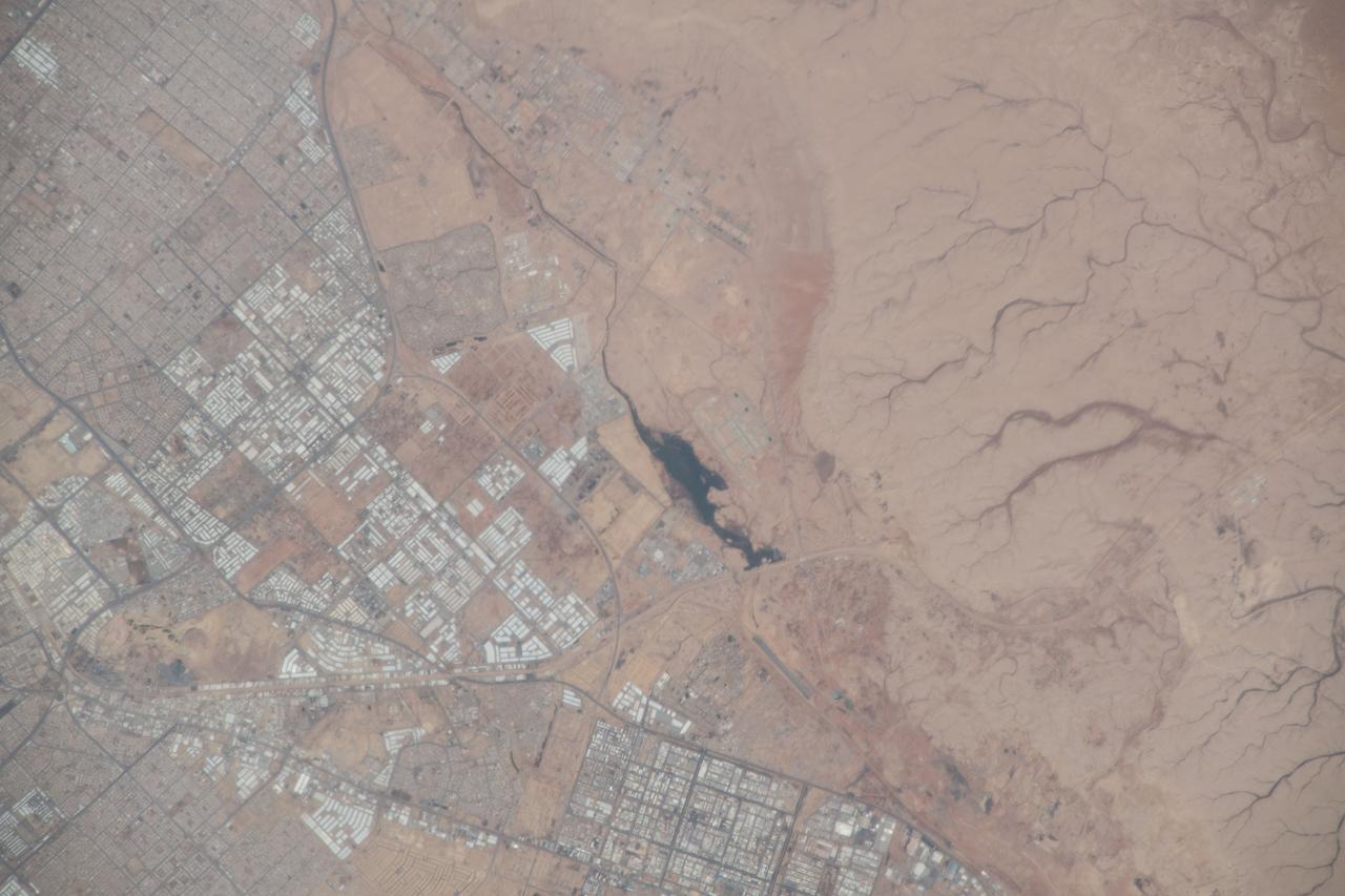 iss055e020443 (April 10, 2018) --- The southwest portion of the city of Riyadh and a body of water were pictured as the International Space Station orbited above in the desert nation of Saudi Arabia.