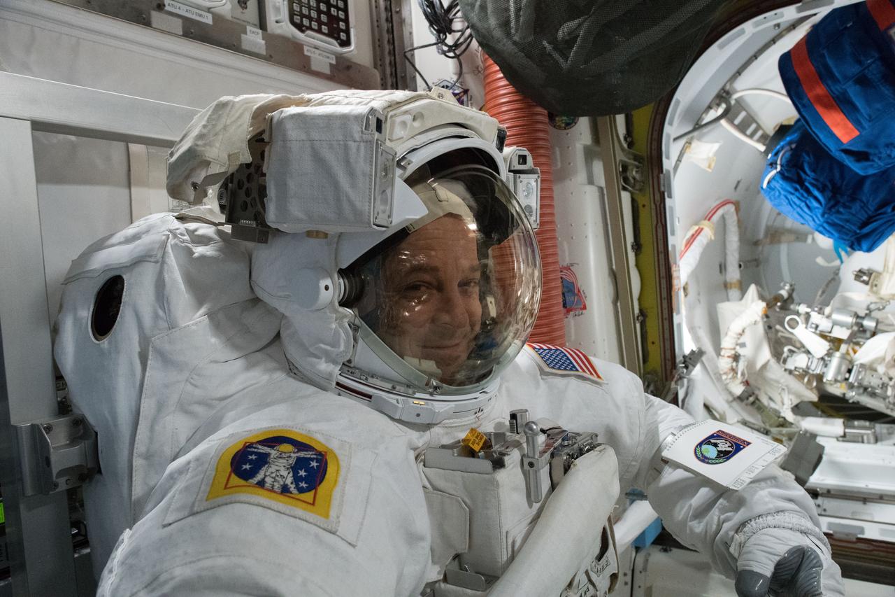 iss055e063891 (May 7, 2018) --- NASA astronaut Ricky Arnold is pictured inside a U.S. spacesuit for a fit check verification ahead of a pair of spacewalks.